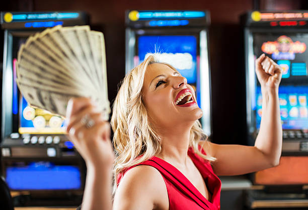 Multi-camera live-dealer studio setup showing blackjack and roulette tables at slot asli777